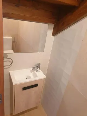 a bathroom with a sink and a mirror at Casa Larán in Chantada