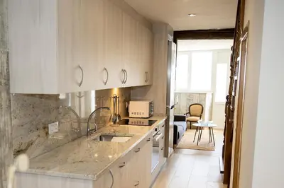 a kitchen with a sink and a counter top at Casa Larán in Chantada