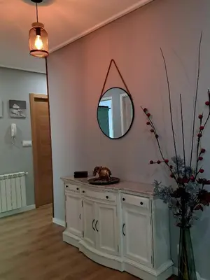 a bathroom with a mirror on the wall at Piso en Ourense- Sempre Maruxiña in Ourense