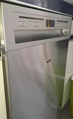 a microwave oven with its door open in a kitchen at Piso en Ourense- Sempre Maruxiña in Ourense