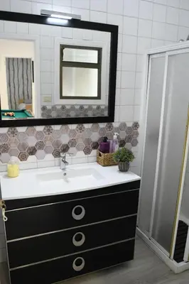 a bathroom with a sink and a shower at O Monteiriño in Arbo