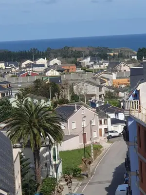 arial view of a small town with a palm tree at Apartamento Exclusivo Céntrico con parking Estrella de Ribadeo II in Ribadeo