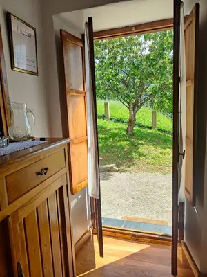a kitchen with a door open to a yard at Villa Doiras in Boal