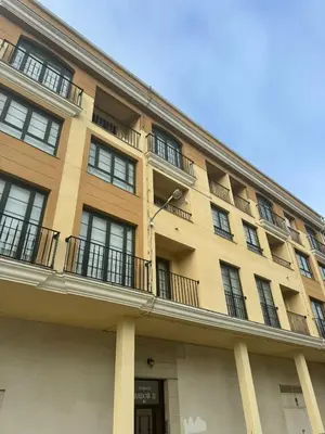 a building with balconies on the side of it at Orbayu apartamento Foz in Foz