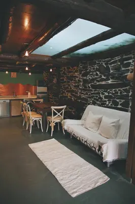a bathroom with a shower with a toilet in it at La Casita de Coelho in Doade