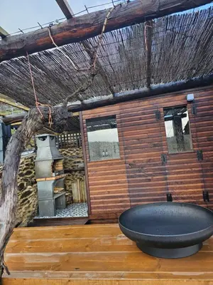 a bathroom with a large bath tub on a wooden floor at Viña Candaz By Oktheway in Taboada