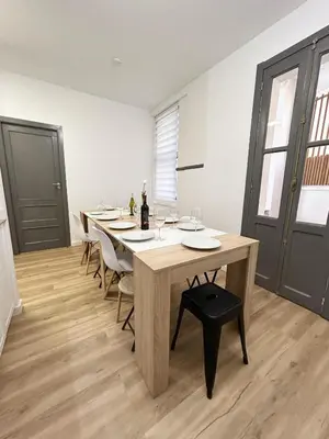 a large dining room with a table and chairs at Catapiro - Confort Elegante y Exclusivo en el Corazón de la Ciudad in Ourense
