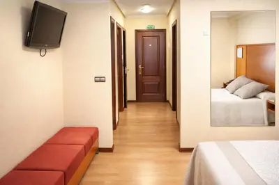 a bathroom with a sink and a shower at Motel Punta Cana in Santiago de Compostela