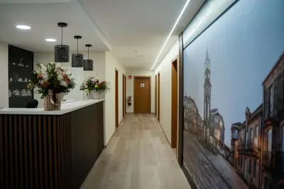 a corridor in a building with a long hallway at A Quinta de Cea in Cea
