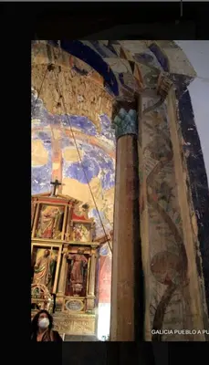 a room with a ceiling with paintings on it at Casa Alba in Chan de Vilar