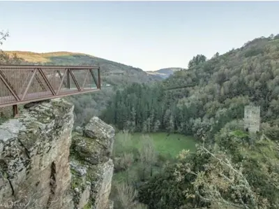 a wooden bridge on top of a rocky mountain at Casa Alba in Chan de Vilar