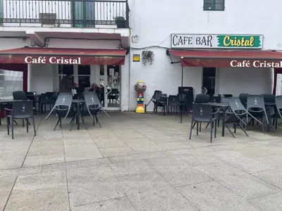 a group of tables and chairs outside of a restaurant at Campo de la Compañía in Monforte de Lemos