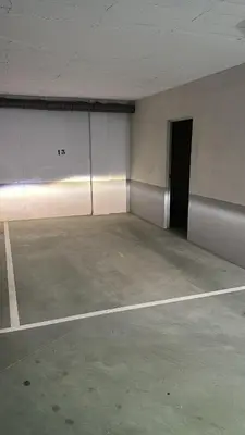 a large empty room with a door in a building at Cortiñas in Villalba
