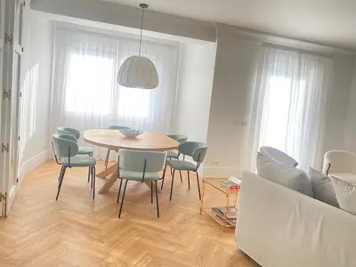 a dining room with a table and chairs at oh la life! at the top in Santiago de Compostela