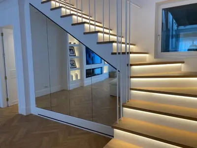 a staircase in a house with a glass railing at oh la life! at the top in Santiago de Compostela