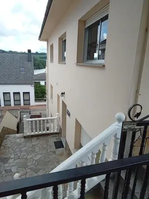 a view from the balcony of a house at Pensión Albergue Gonzar in Portomarin