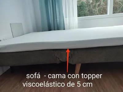 a mattress on a bed frame in a room at O Paseo, 5 estrellas. in Puentedeume
