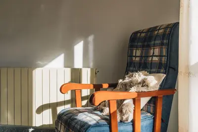 a chair with a stuffed animal sitting on it at Casa Cuco in Corejido
