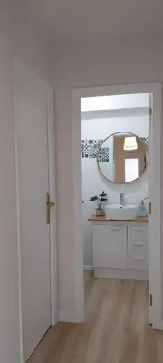 a bathroom with a sink and a mirror at Solerma in Viveiro