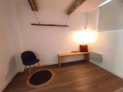 a room with a table and a chair and a light at Lepanto3 - Apartamento amplio y luminoso para disfrutar de Ourense in Ourense