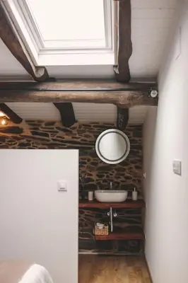 a bathroom with a sink and a mirror on the wall at Casa Amencer in Francos