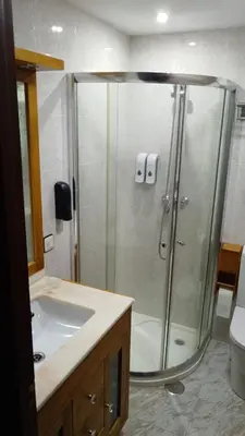 a bathroom with a shower and a sink at Pontedeume cerca del mar y la naturaleza in Puentedeume