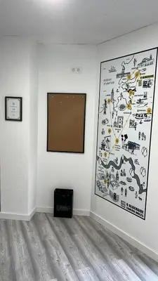 a room with a large painting on a wall at O Albergue de Fene in Fene