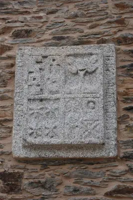 a stone plaque on the side of a building at Pazo Santa María in Arzúa