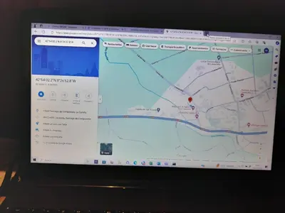 a laptop computer screen with a map on it at Restaurante y Hostal San Paio in Santiago de Compostela