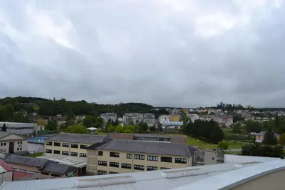 a view of a city with buildings and trees at Ático Xacobeo 360 views in Sarria