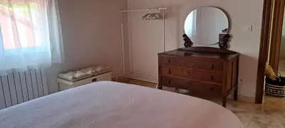 a bedroom with a dresser with a mirror on it at Casa Castrexa in Novoa