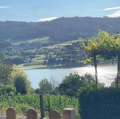 a view of a river from a fence at CASA DO XASTRE in Arnego