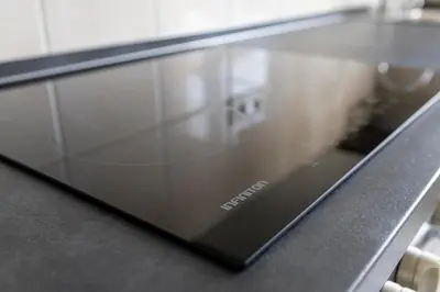 a laptop computer sitting on top of a counter at Piso Turístico Las Nisas I in Puerto de Vega