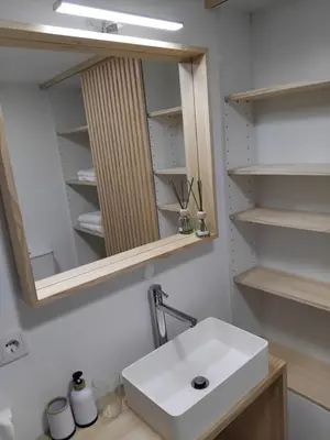 a bathroom with a sink and a mirror at Sita in A Estrada
