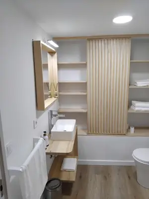 a bathroom with a sink and a toilet at Sita in A Estrada