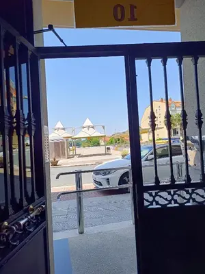 a car is parked outside of a door at Bahía de Miño in Miño