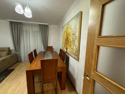 a dining room with a table and chairs and a door at Maison Liberdade By Oktheway in Sarria