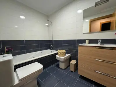 a bathroom with a tub and a toilet and a sink at Maison Liberdade By Oktheway in Sarria