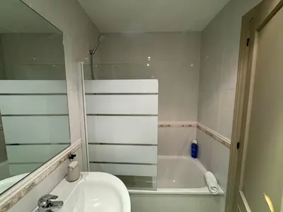 a bathroom with a sink and a bath tub at O Faiado Da Ria By Oktheway in Culleredo
