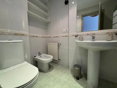 a bathroom with a toilet and a sink at O Faiado Da Ria By Oktheway in Culleredo