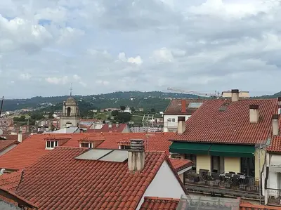 a view of a city with red roofs at Lepanto 4 - Precioso y súper luminoso dúplex con vistas in Ourense