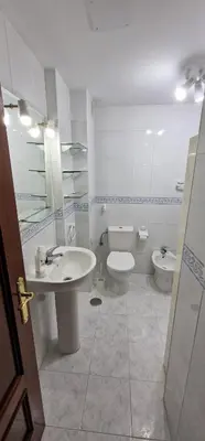 a bathroom with a sink and a toilet at El Mirador de Covas - 2 Hab - Garaje in Covas