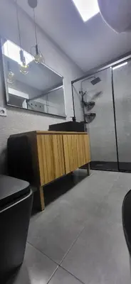 a room with a desk with a mirror and a counter at Las Gaviotas in Viveiro