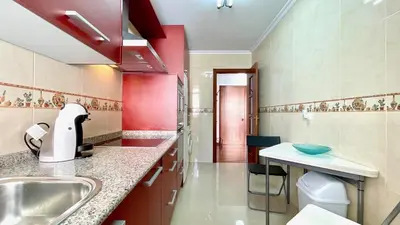 a kitchen with a sink and a counter top at The Cliffs - ViveMare in Viveiro