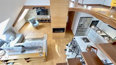 an overhead view of a living room and kitchen at The Cliffs - MarCastelos in Viveiro
