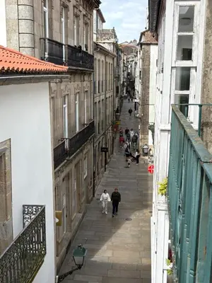 an overhead view of an alley with people walking down it at Hotel Real in Santiago de Compostela