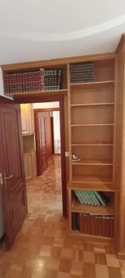 a room with a room with wooden shelves at EnVIVEIRO Destino Playa de Covas in Viveiro