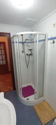a shower with a glass door in a bathroom at EnVIVEIRO Destino Playa de Covas in Viveiro