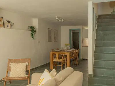 a living room with a couch and a table at Casa Marela in Rinlo