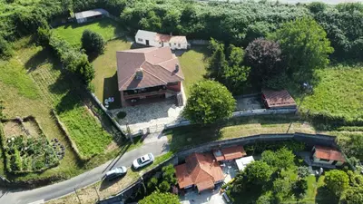 an aerial view of a house with a roof at A casa de Roque 1 in Miño